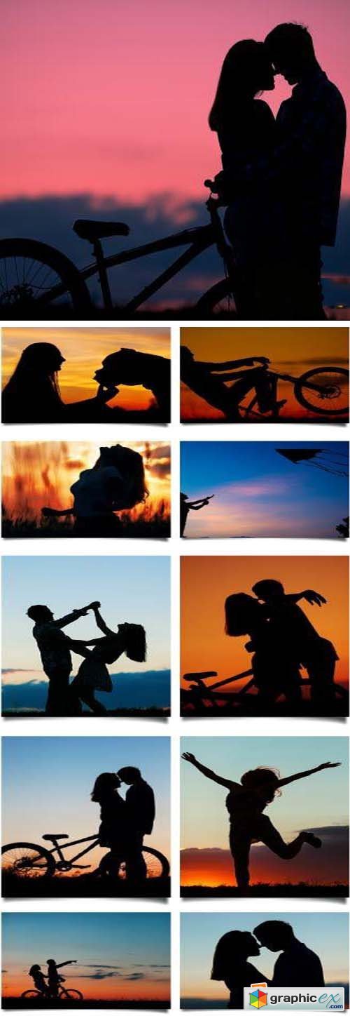 Couple Silhouettes as the Sun Sets 35xJPG