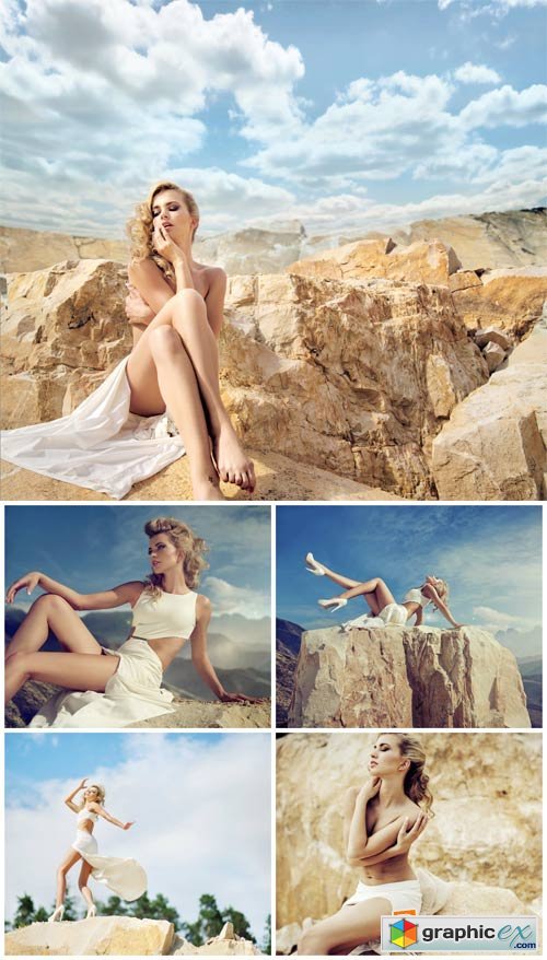 Blonde girl on the rock - Stock Photo