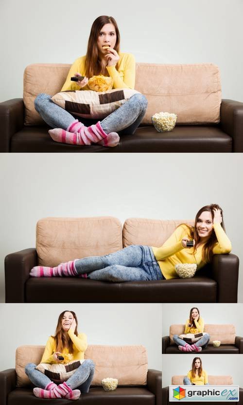 Young Woman Watching TV on the Couch