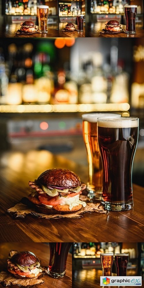 Hamburger and dark beer on a pub background