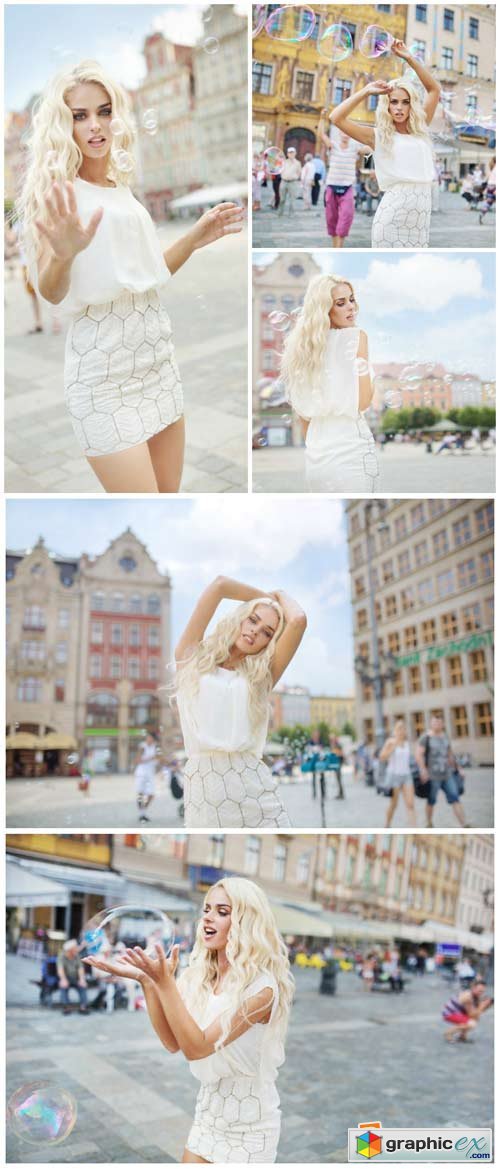 Beautiful blonde on a walk in the city - Stock Photo
