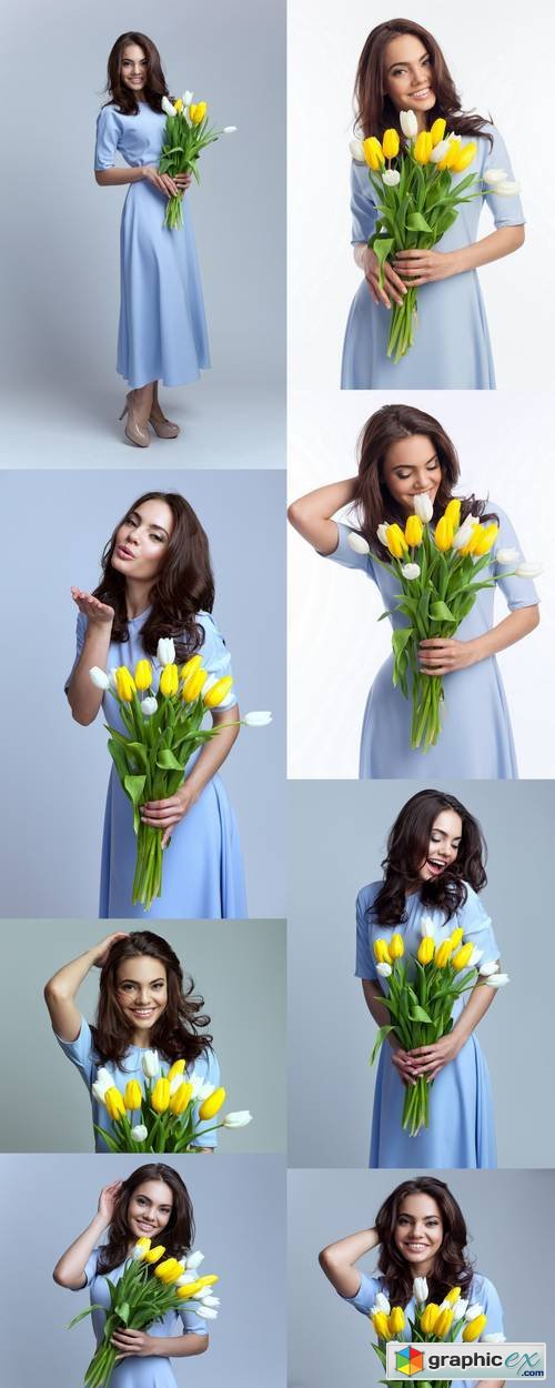 Beautiful Girl in the Blue Dress with Flowers Tulips in Hands